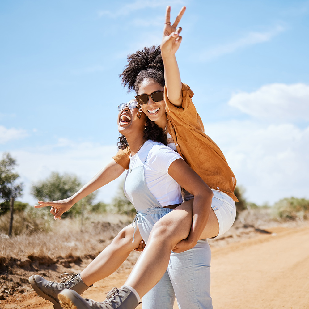 Travelers piggyback ride